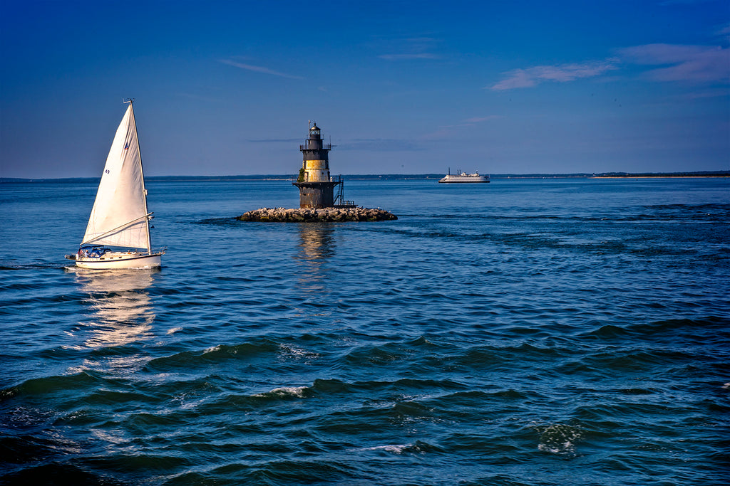Sailboat and Lighthouse