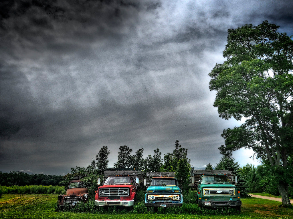 Four Vintage Trucks