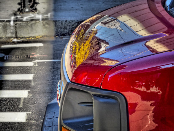 Reflections On A Red Truck